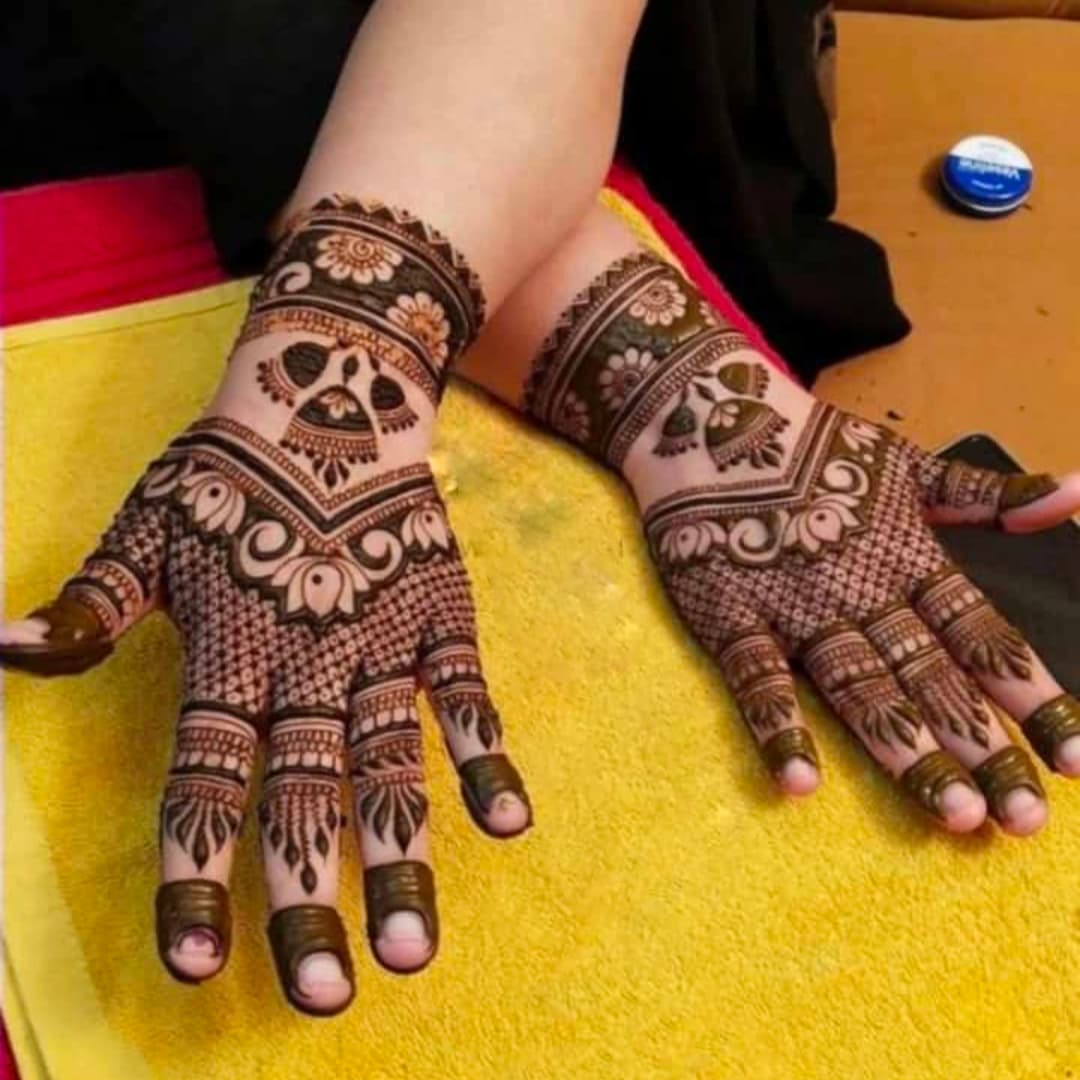 Full hand 3D bridal mehndi design with elegant floral motifs and shaded detailing