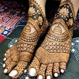 Intricate bridal mehndi design with floral and mandala patterns