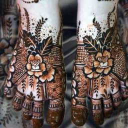 Full hand bridal mehndi design with elegant floral artwork