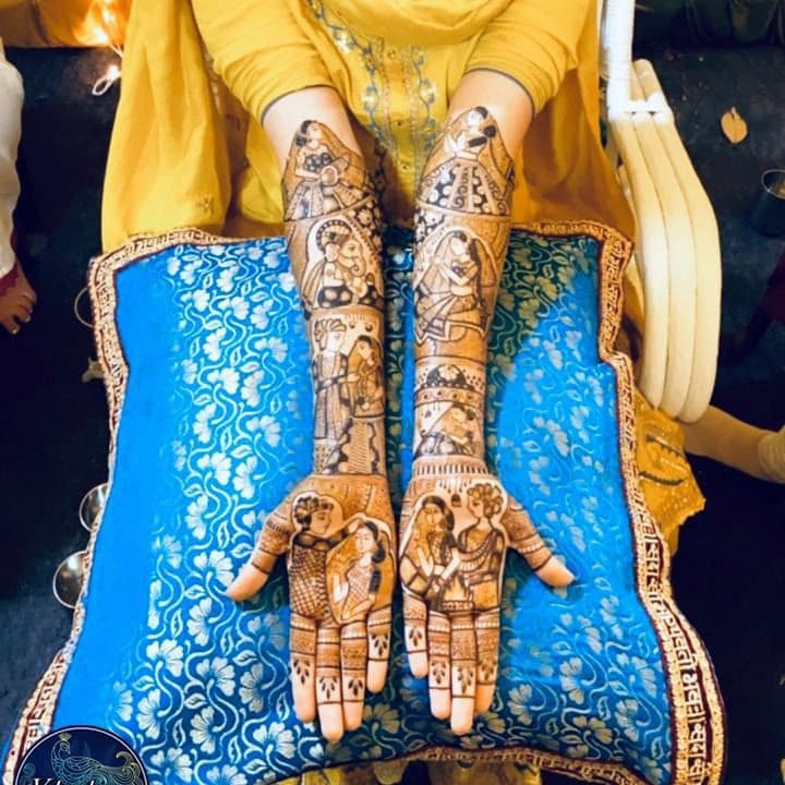 Wedding bridal mehndi covering hands with traditional artwork