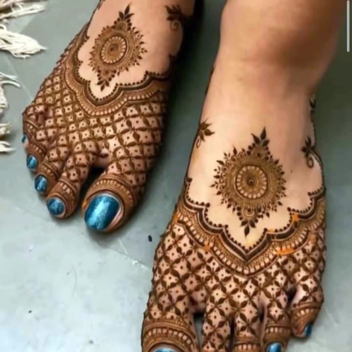 Bridal henna design with intricate paisley patterns
