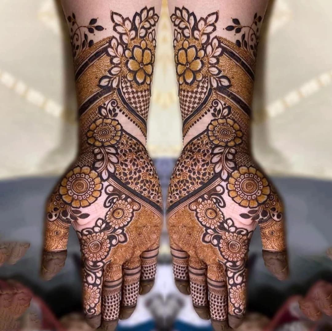 Artistic engagement mehndi design featuring detailed floral and leafy elements