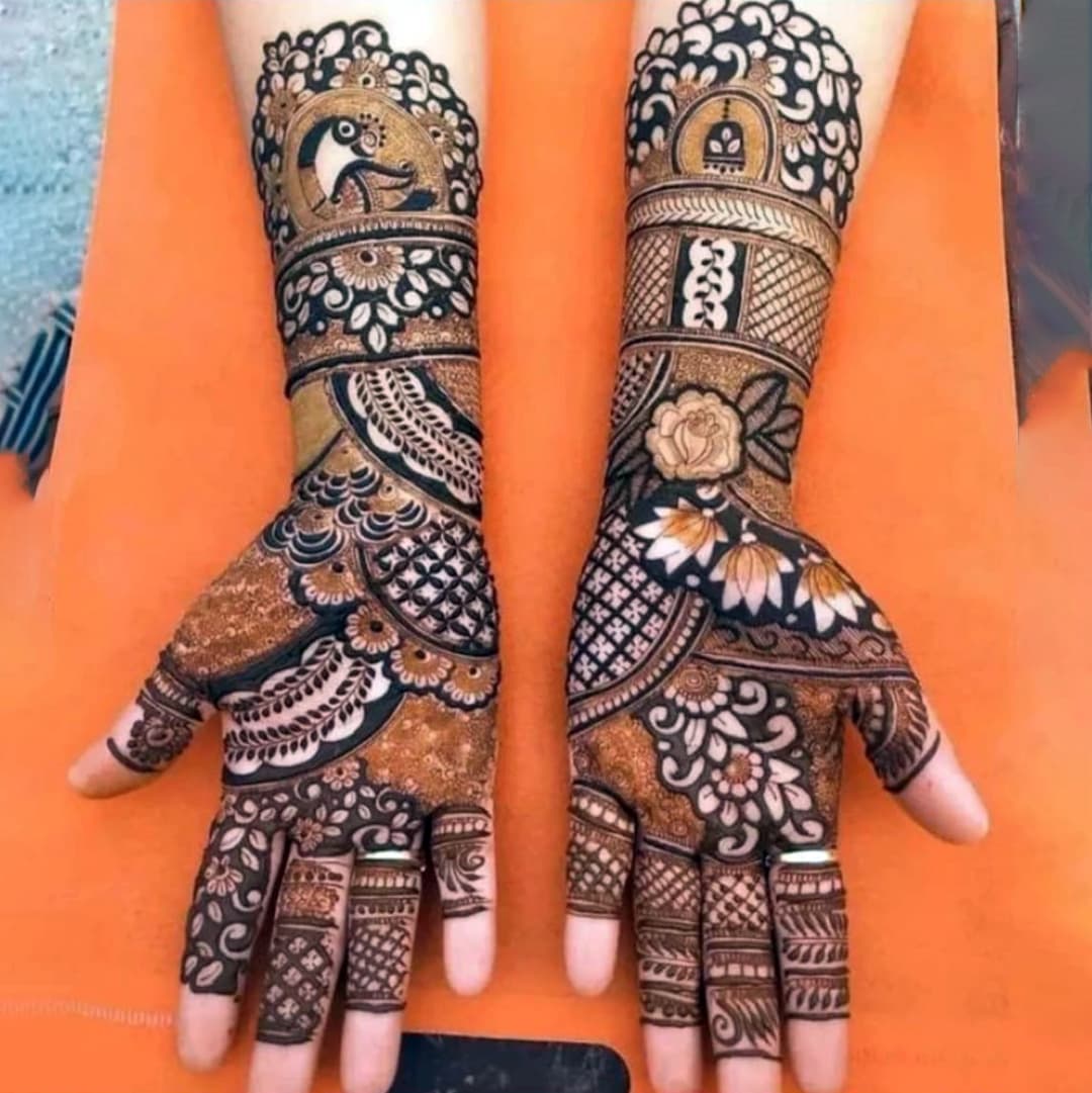 Elegant engagement mehndi featuring decorative mandala and floral patterns
