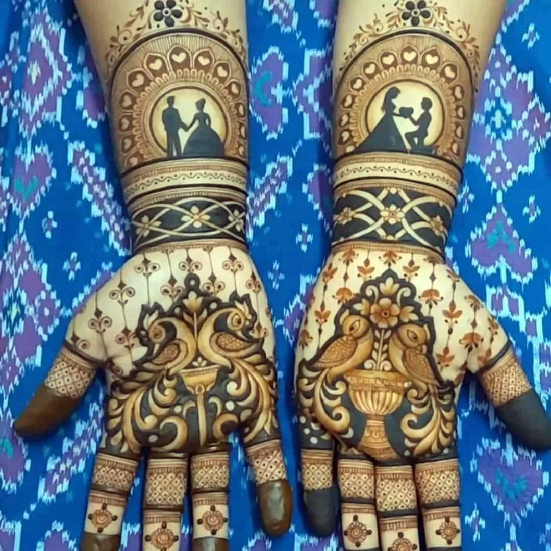 Graceful engagement henna design with detailed finger and wrist decoration