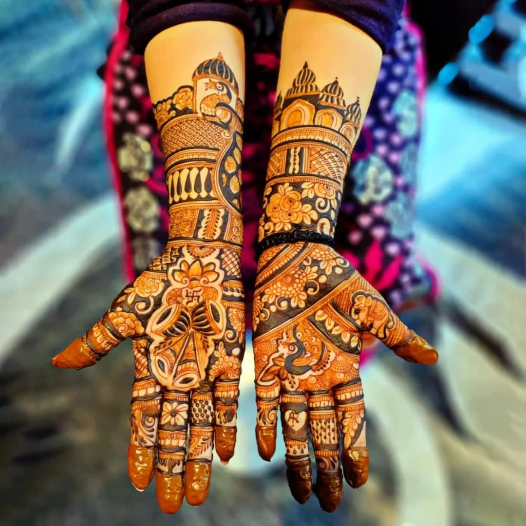 Modern engagement henna design with elegant finger and wrist detailing