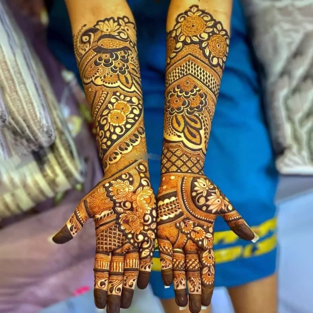Beautiful engagement mehndi design with intricate mandala and floral motifs