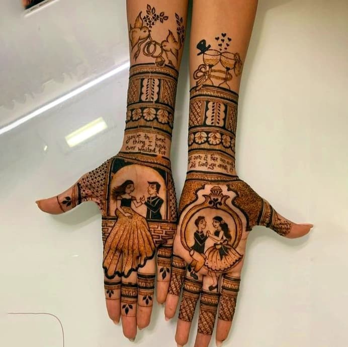 Traditional engagement mehndi featuring floral vines and ornamental hand patterns