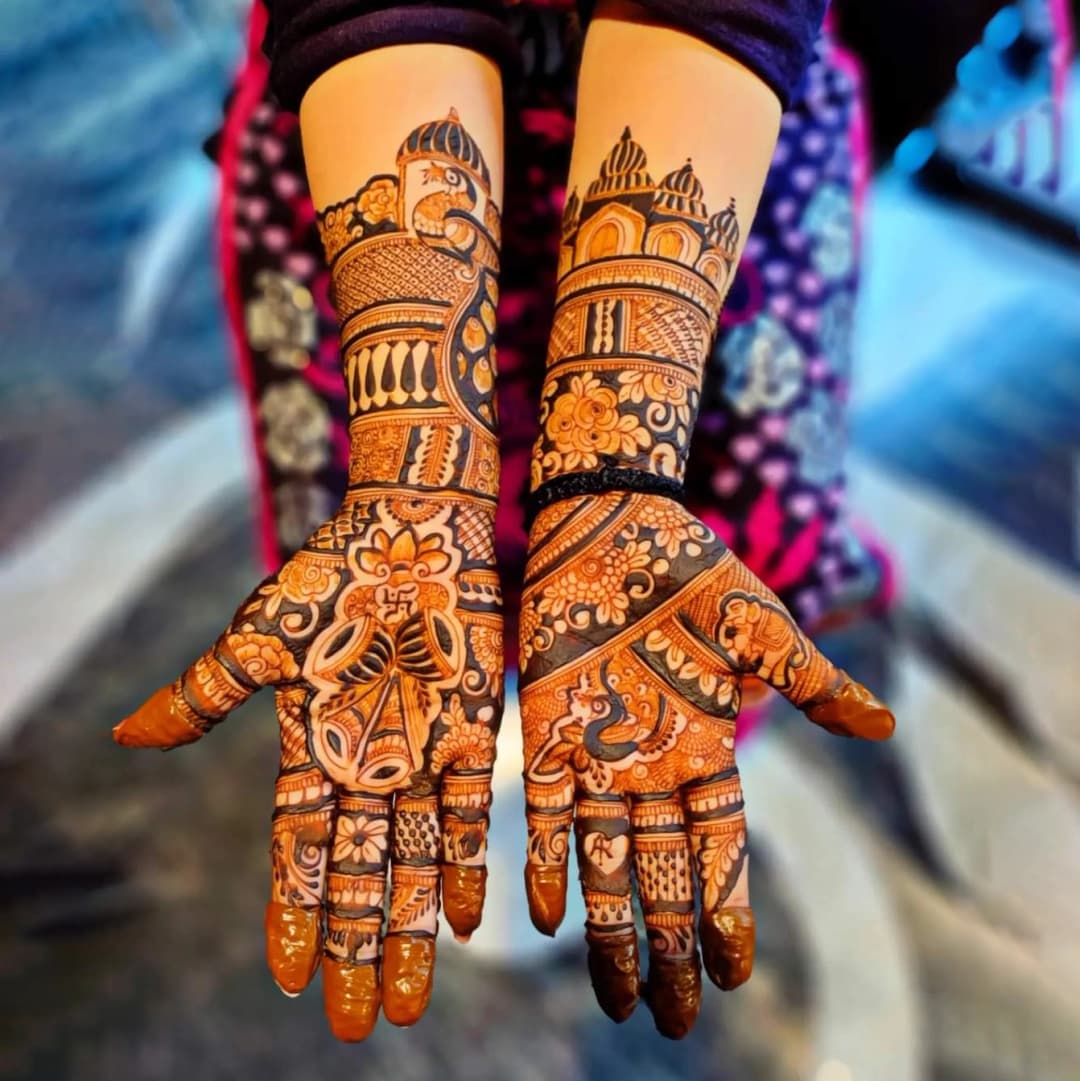 Minimal traditional mehndi design with delicate finger patterns