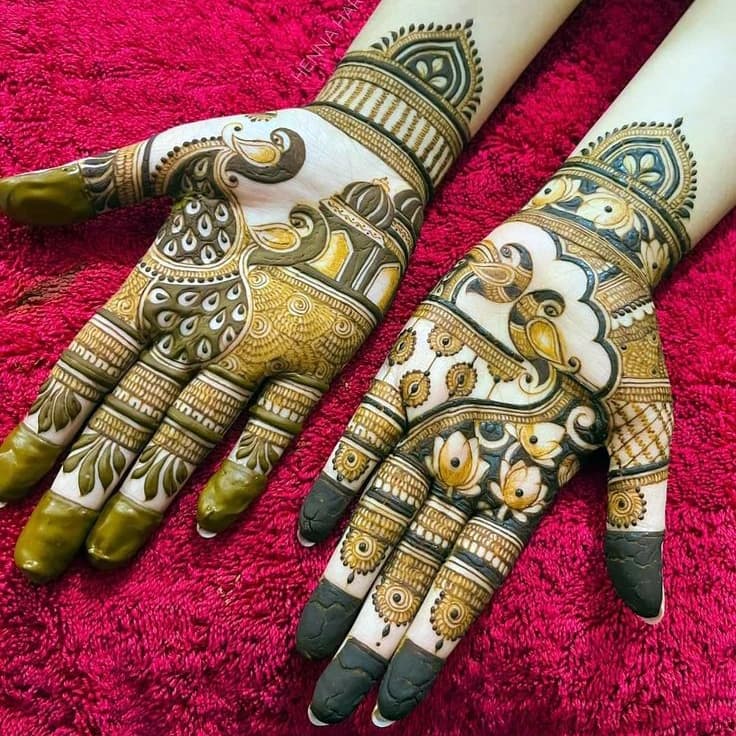 Back hand mehndi featuring floral vines and fine detailing