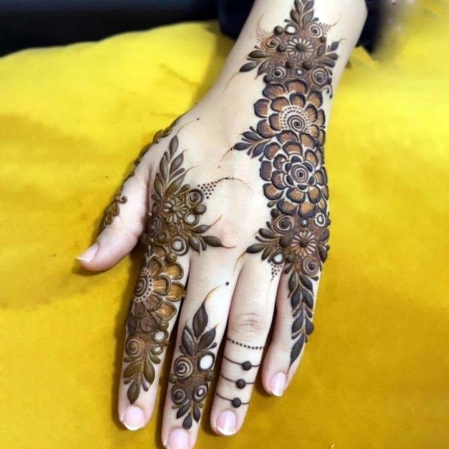 Traditional mehndi artwork with elegant curved floral patterns